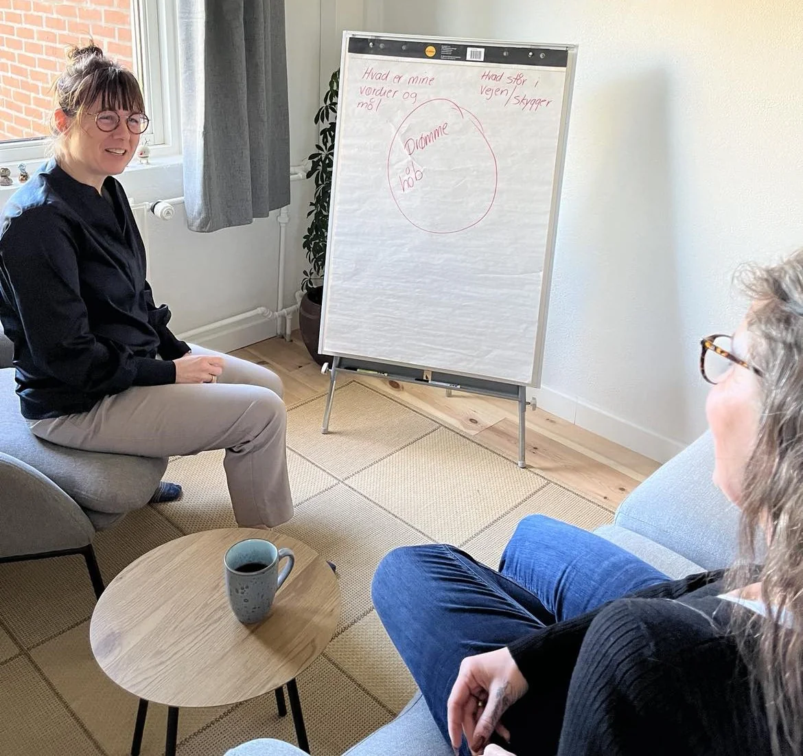 Therapist sitting with patient