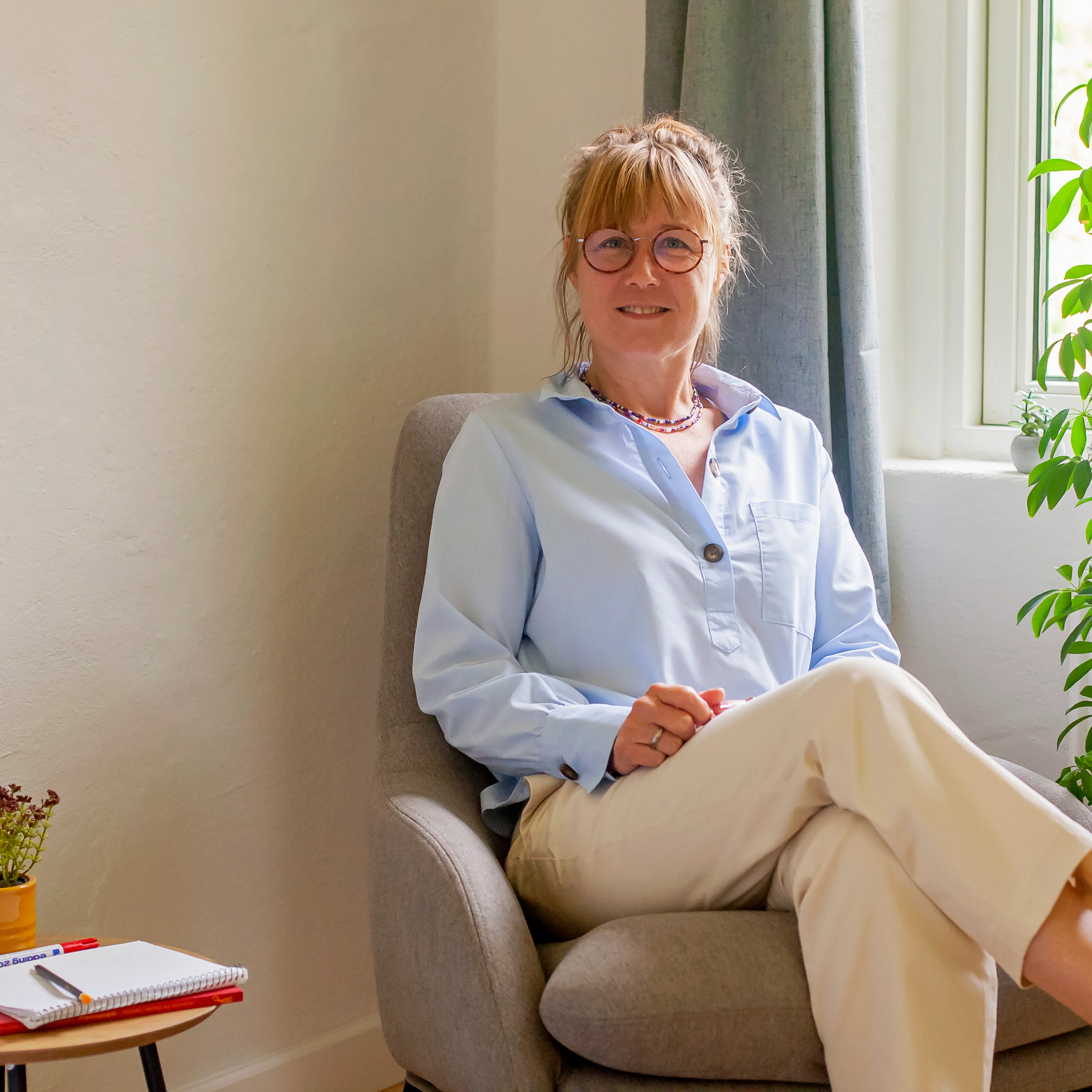 Therapist sitting with patient