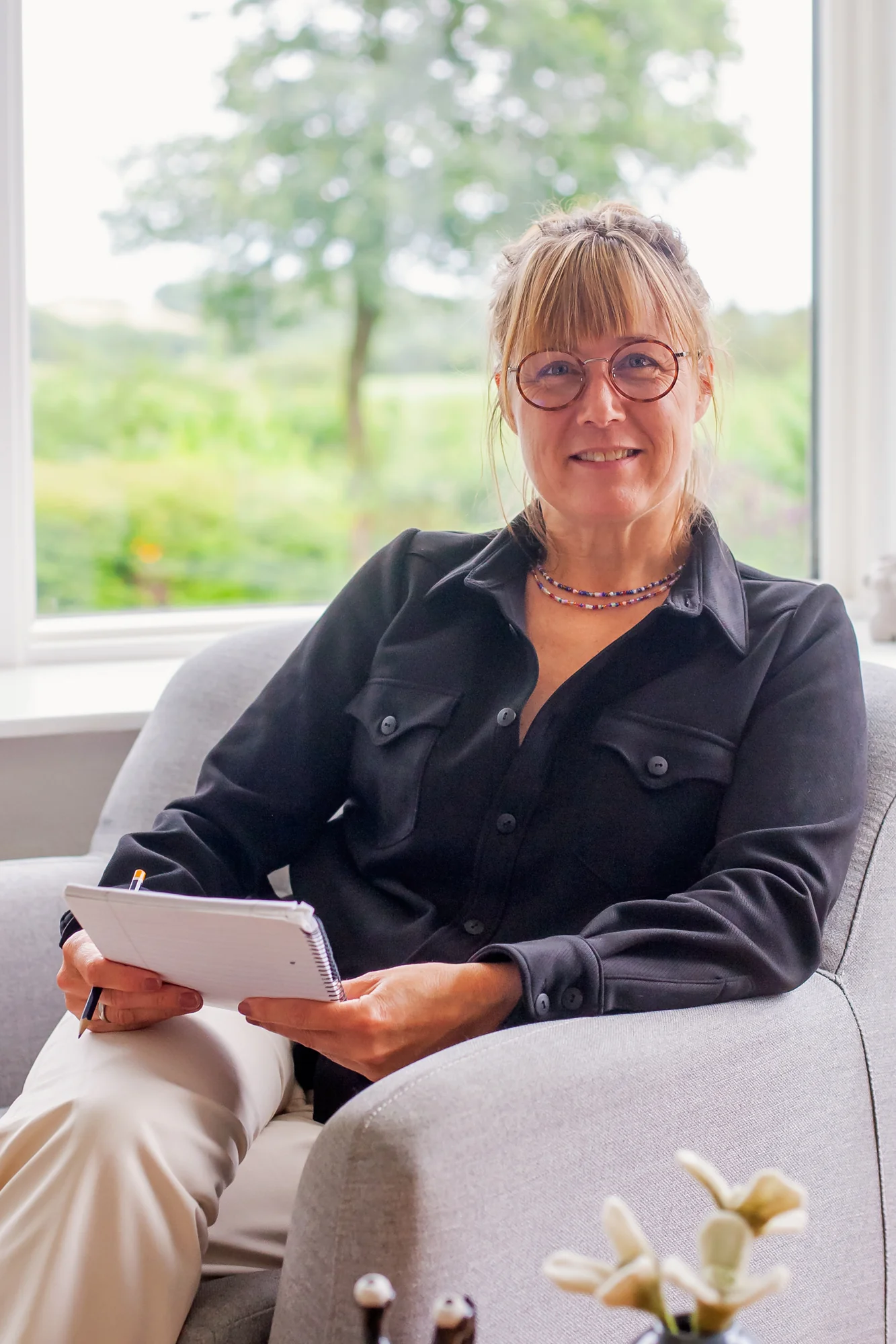 Therapist sitting in chair ready to listen